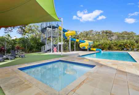 Pool area with two heated pools and 35m waterslide